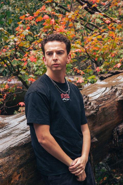 Model wearing the Dracu La tee in black, front