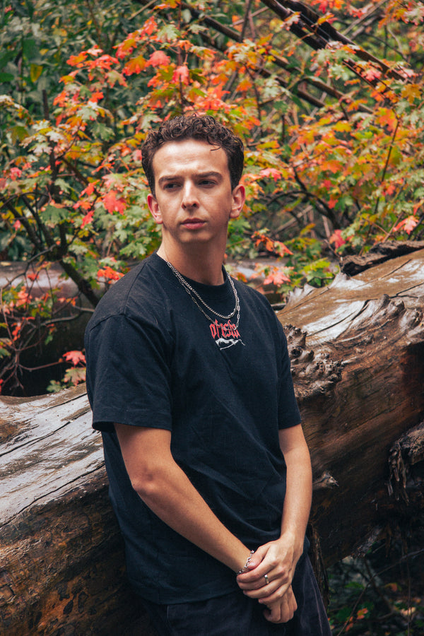 Model wearing the Dracu La tee in black, front